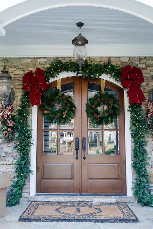 Front doors decorated for the holidays.