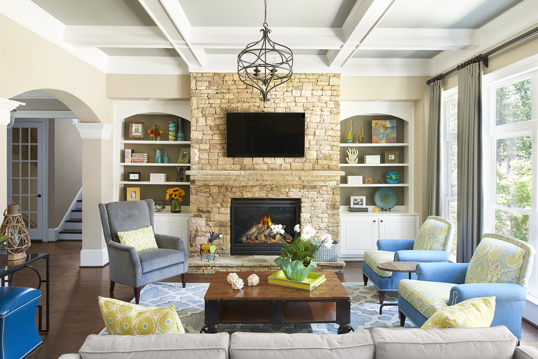 Coastal inspired family room with gas fireplace designed by Robin LaMonte