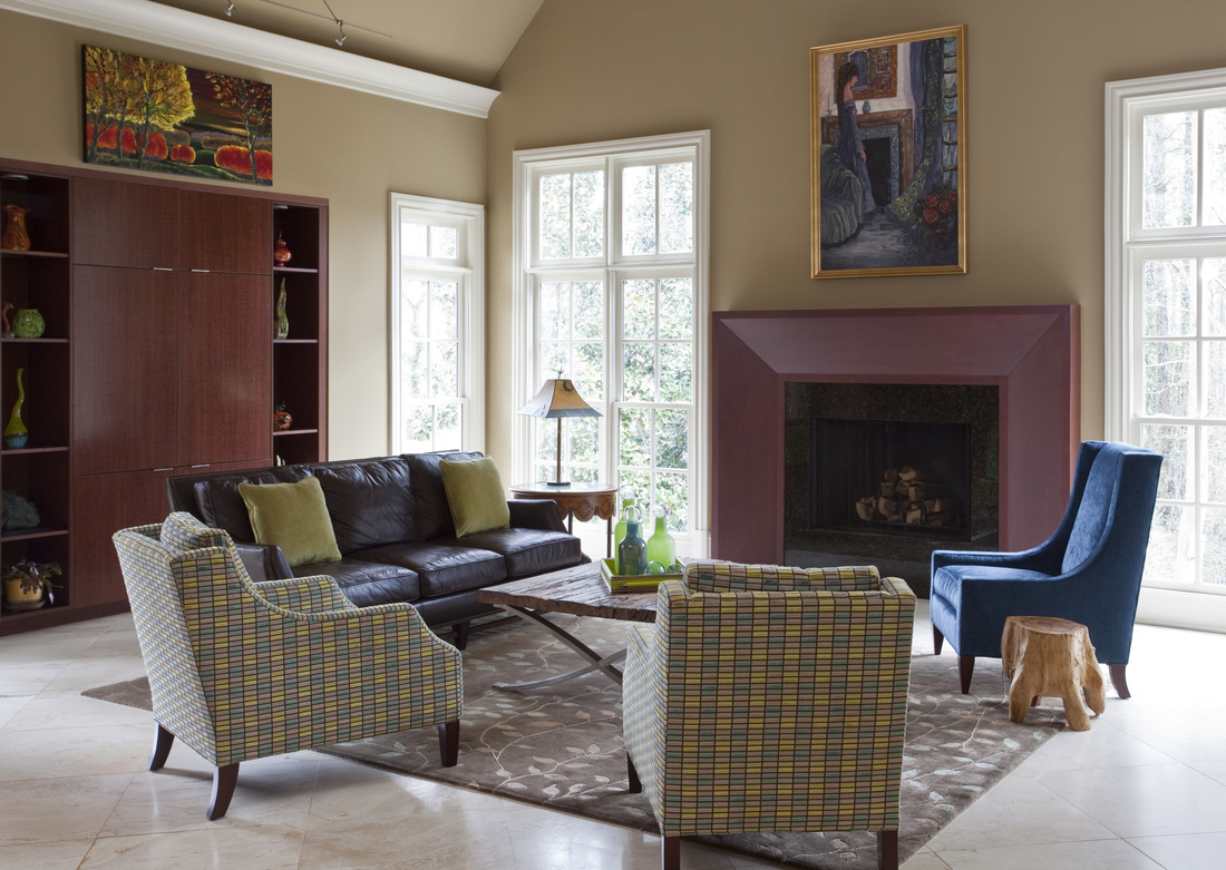 Family room with wood burning fireplace designed by Robin LaMonte