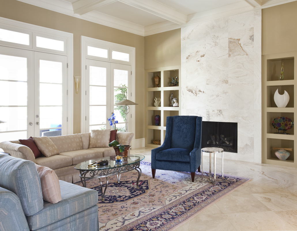 Living room with gas fireplace designed by Robin LaMonte